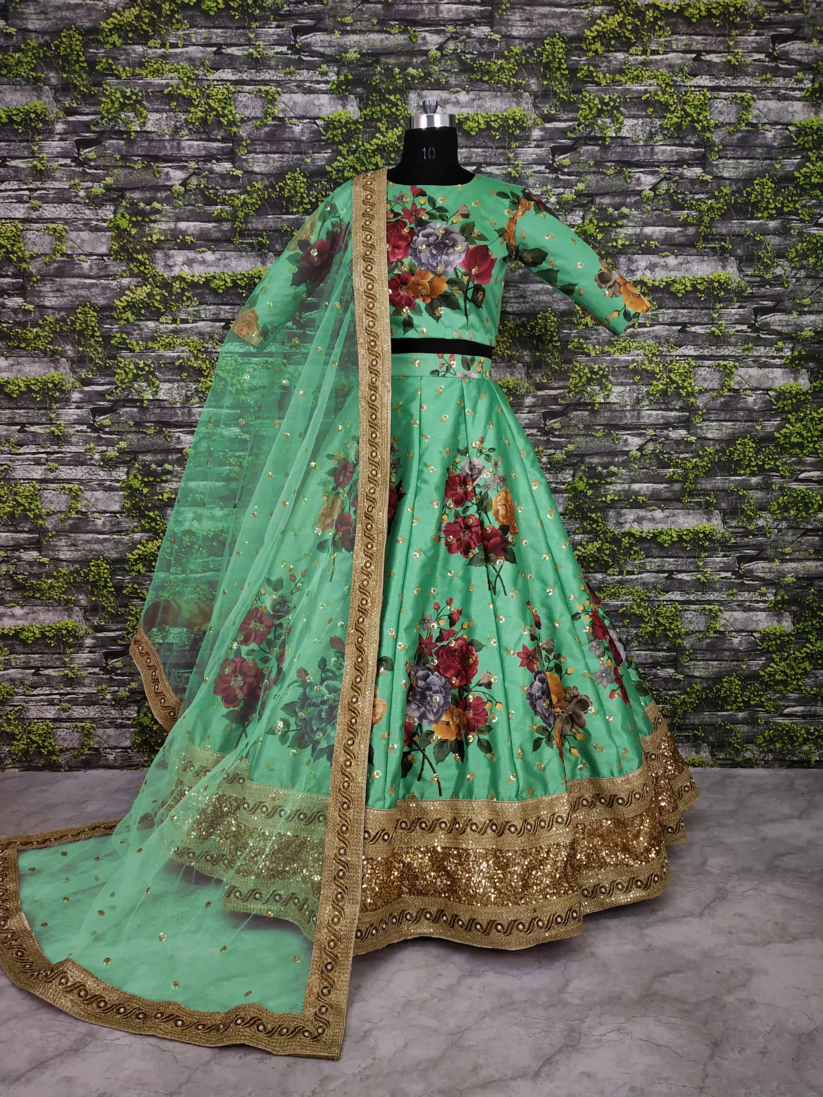 Gorgeous Green Colored Partywear Designer Embroidered Lehenga Choli